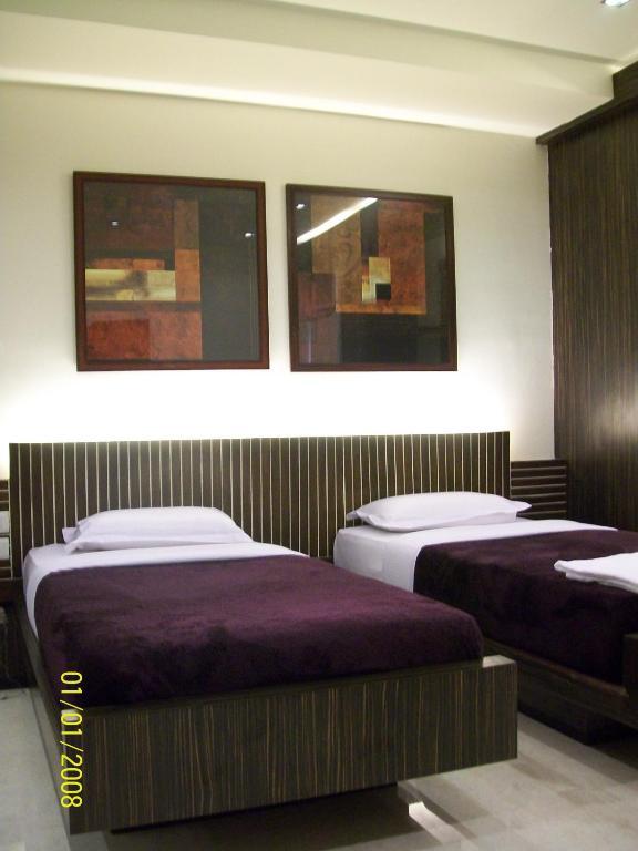 Hotel Victerrace Regency Calcutá Quarto foto